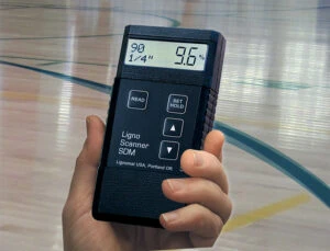 Pinless moisture meter measures moisture content in wood to determine if wood is stable.